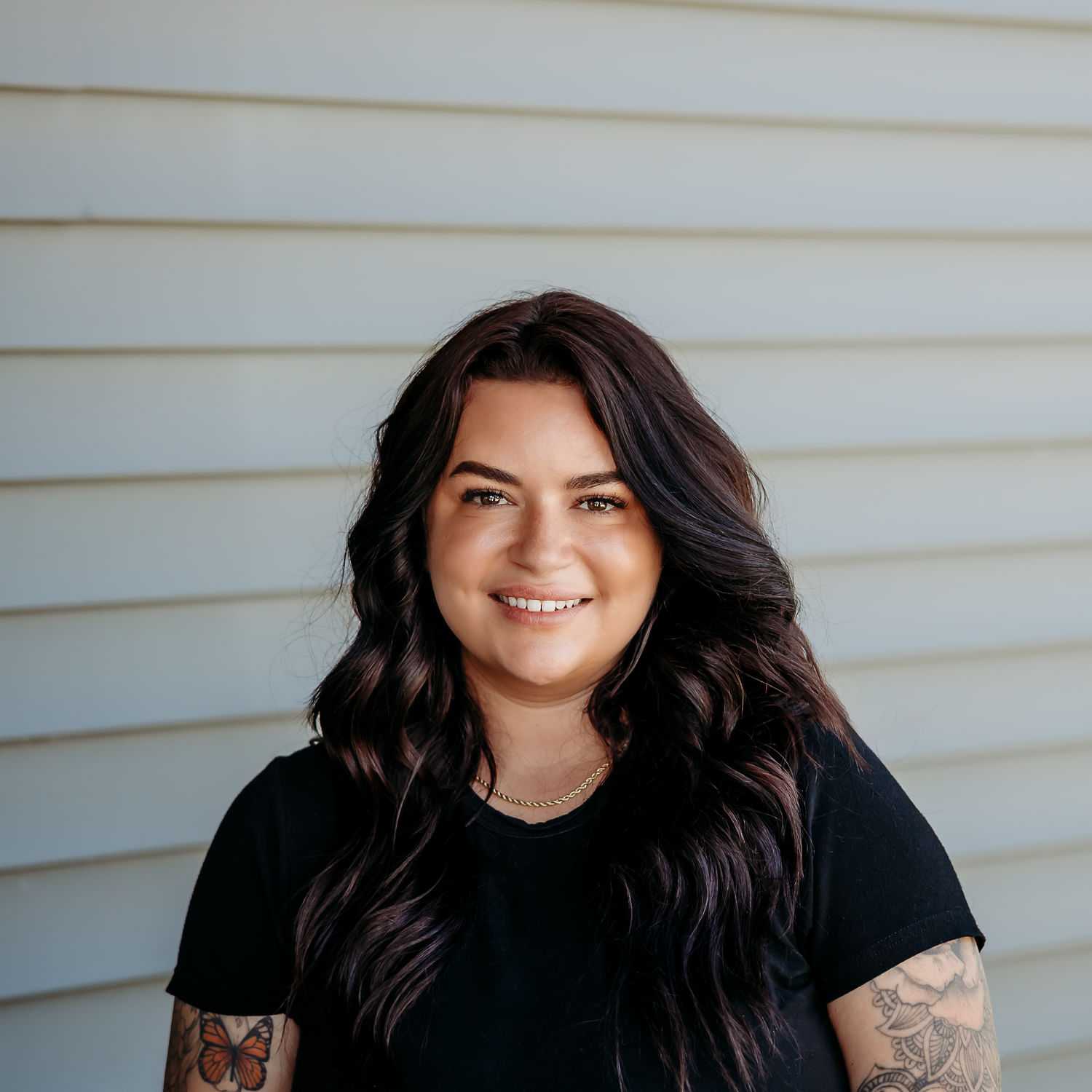 Portrait of Makayla G., a professional stylist at Revive Salon & Spa, showcasing their expertise and style.