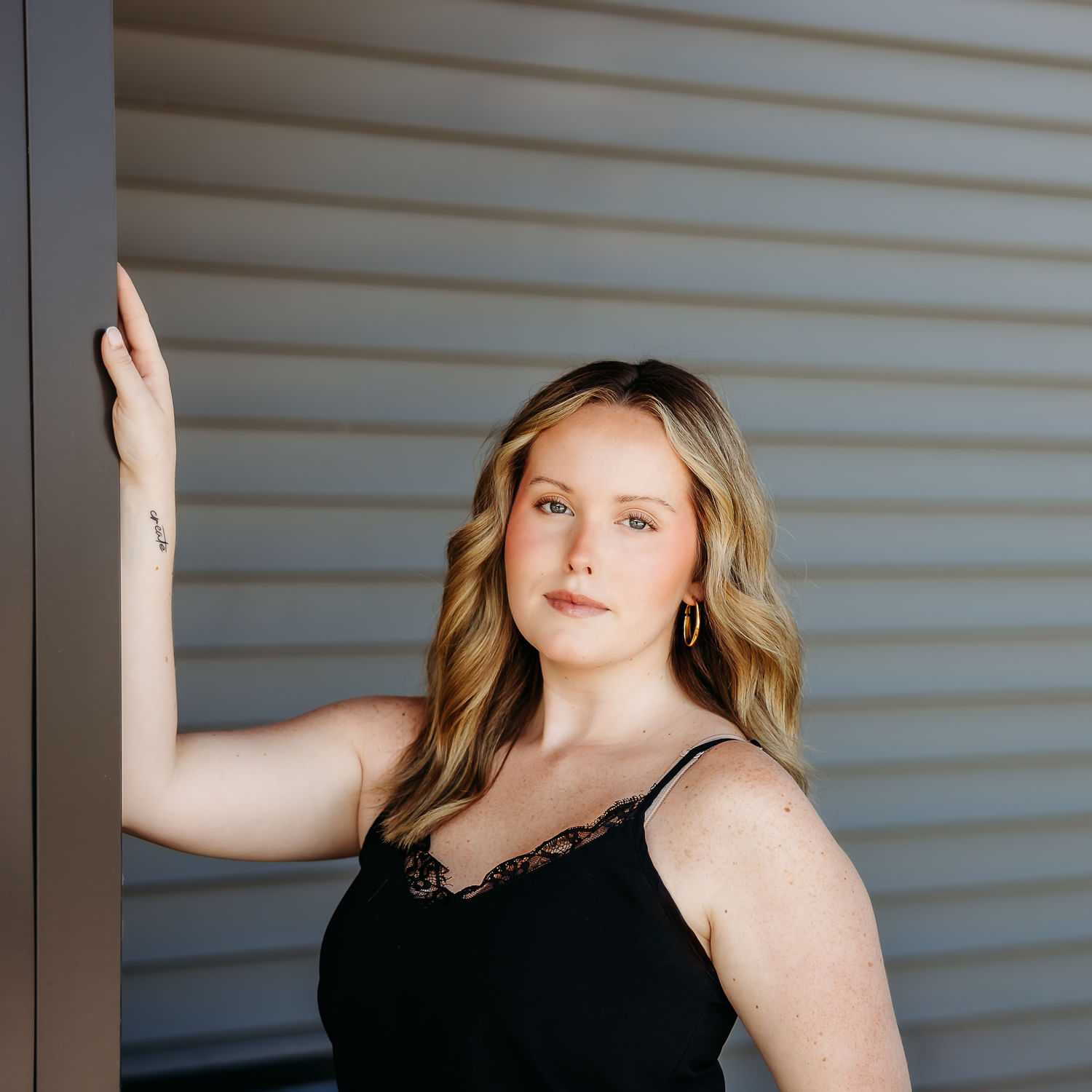 Portrait of Gabrielle D., a professional stylist at Revive Salon & Spa, showcasing their expertise and style.