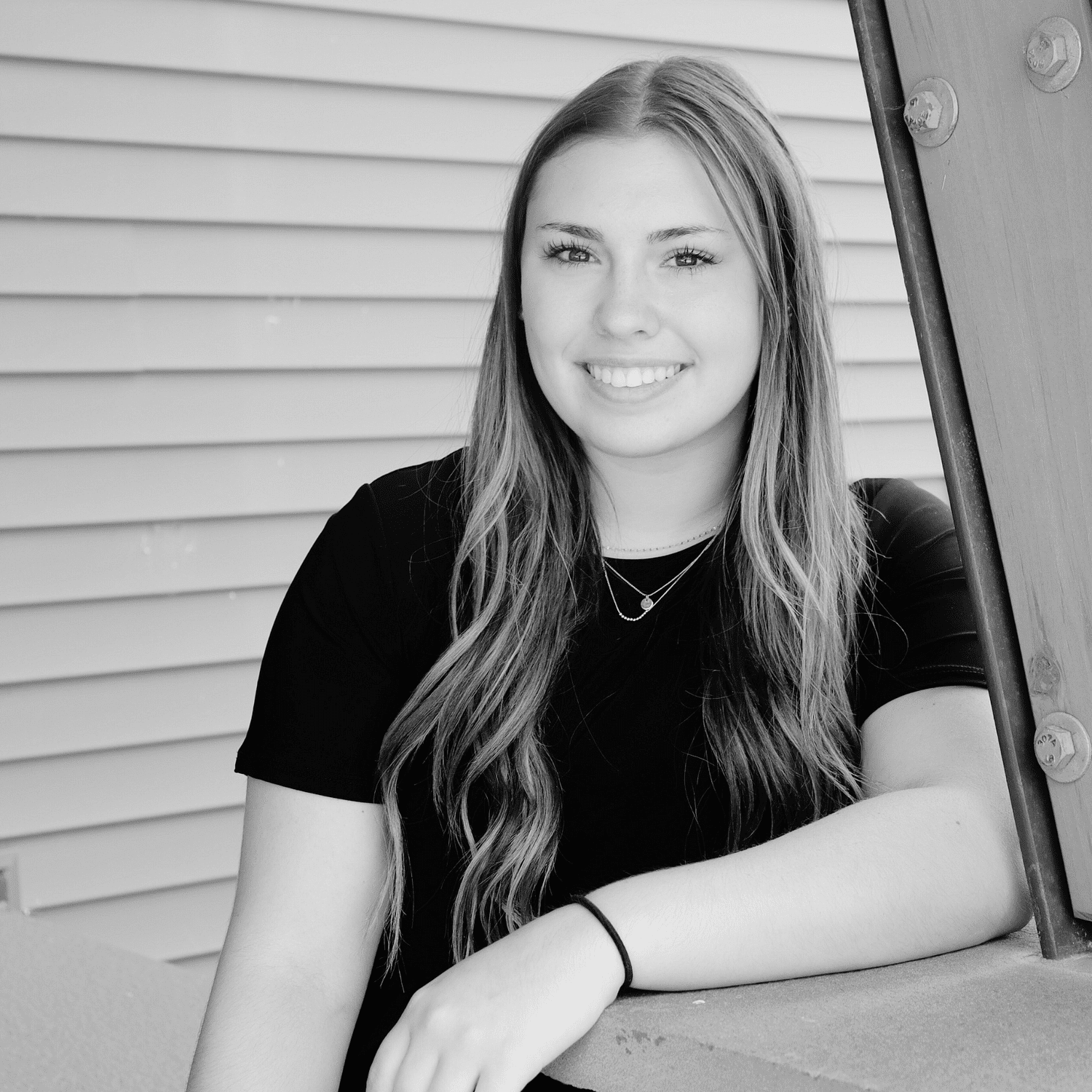 Portrait of Haley C., a professional stylist at Revive Salon & Spa, showcasing their expertise and style.