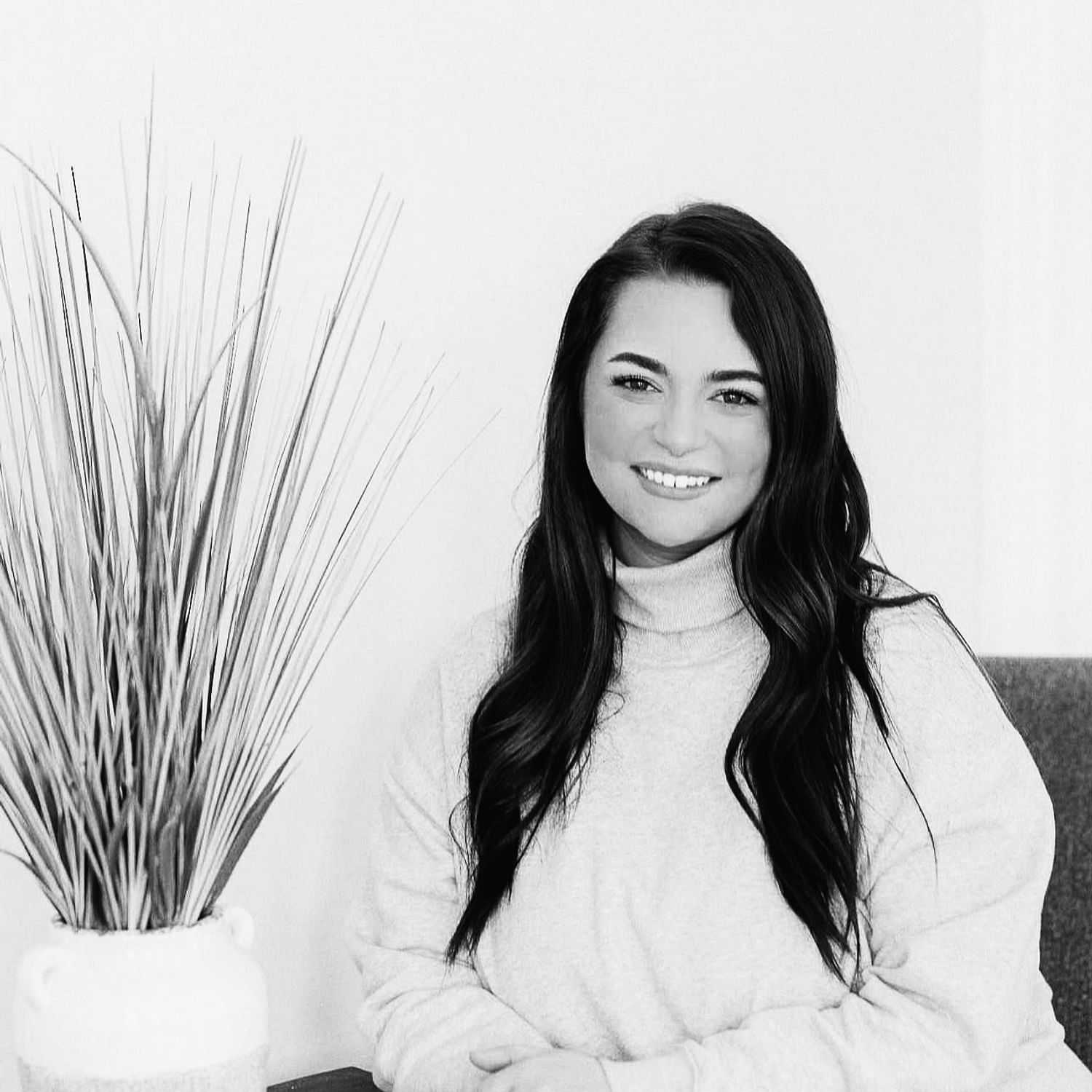 Portrait of Makayla G., a professional stylist at Revive Salon & Spa, showcasing their expertise and style.
