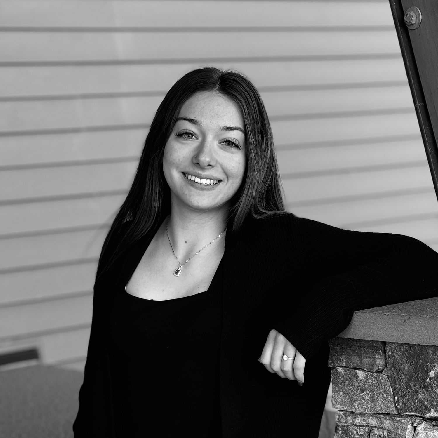 Portrait of Mackenzie A., a professional stylist at Revive Salon & Spa, showcasing their expertise and style.