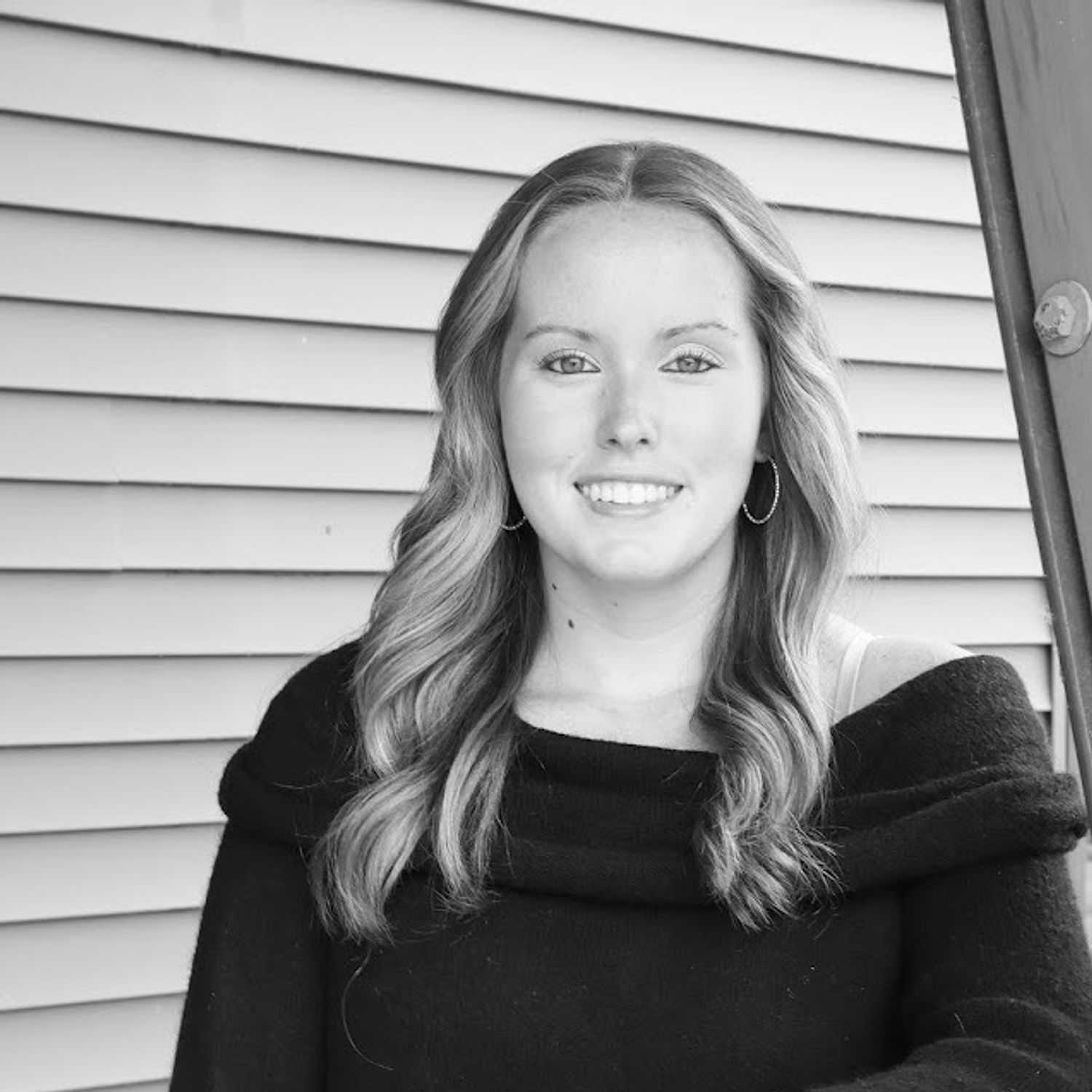 Portrait of Gabrielle D., a professional stylist at Revive Salon & Spa, showcasing their expertise and style.