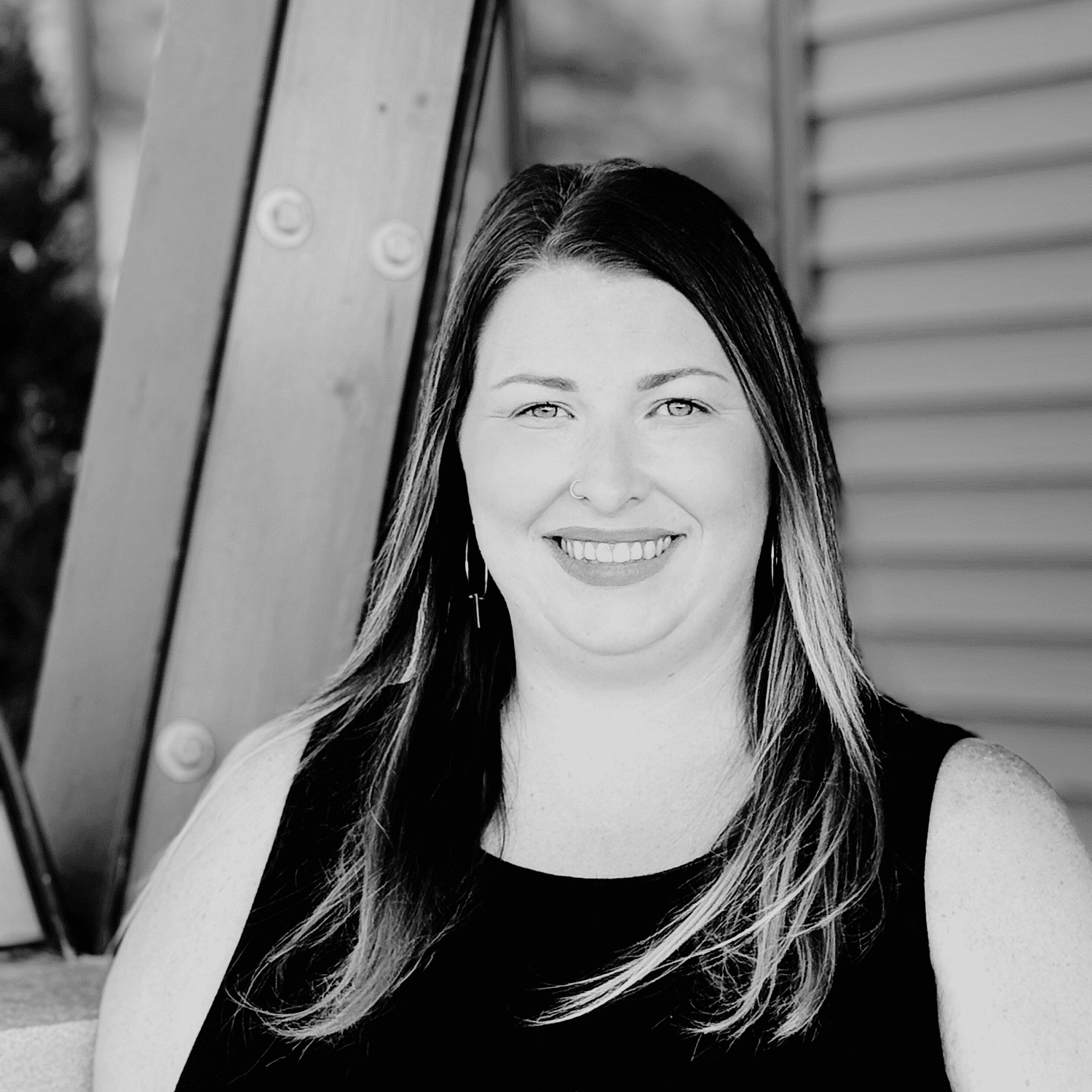 Portrait of Alyssa M., a professional stylist at Revive Salon & Spa, showcasing their expertise and style.